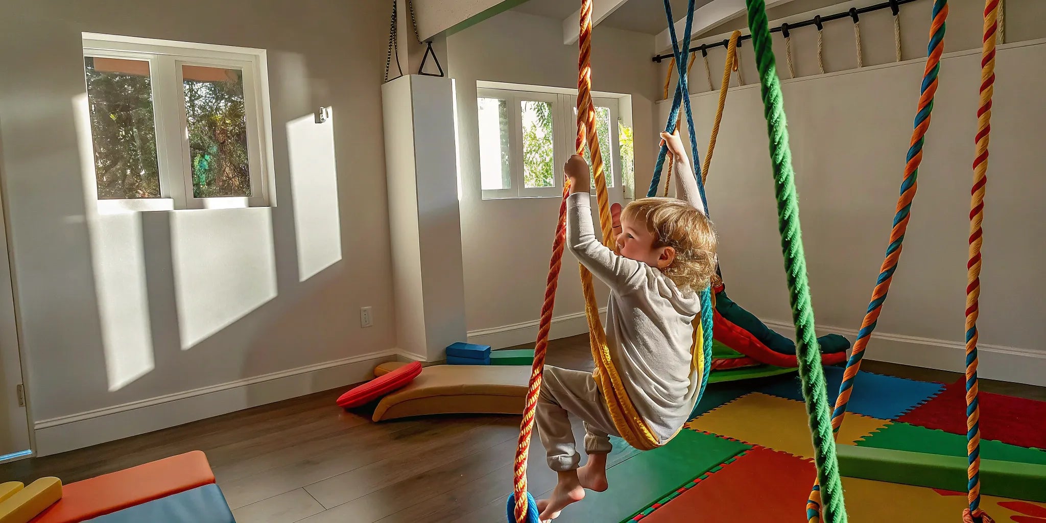 Child using Brainrich play gym.