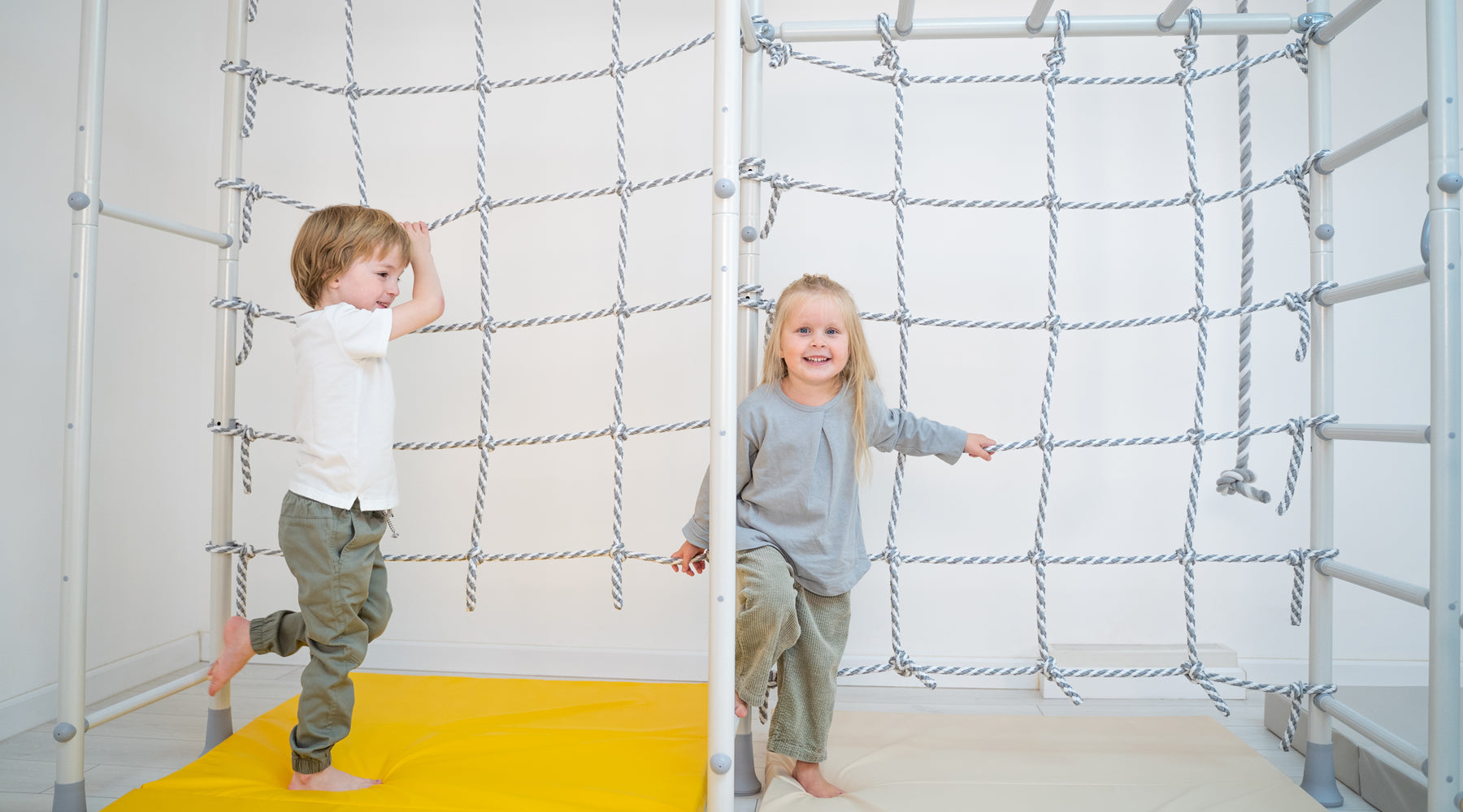 Toddlers playing in an indoor gym